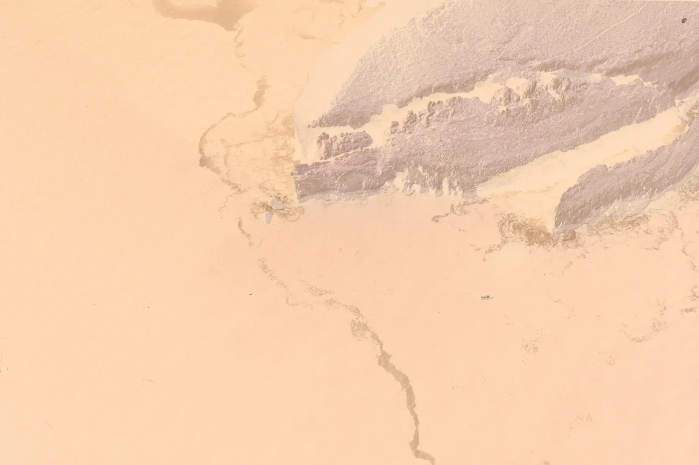 The raw scan of the cliffs: the sea is orange-red, the cliffs dark, the foam a dark line, under the orange base.